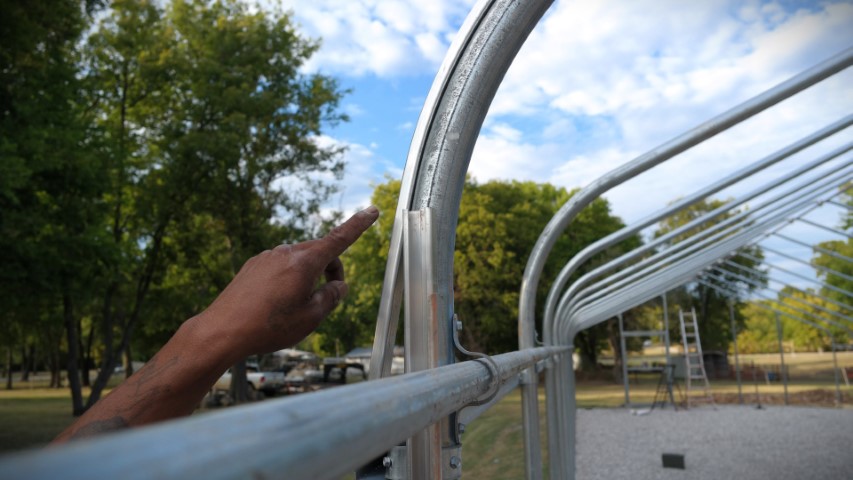 High Tunnel HoopHouse Install Wire Lock Channel