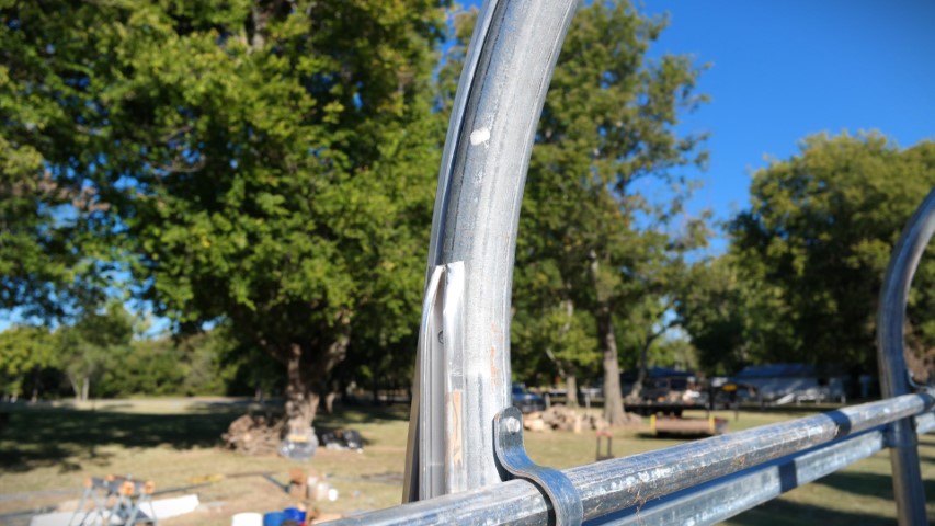 High Tunnel HoopHouse Install Wire Lock Channel