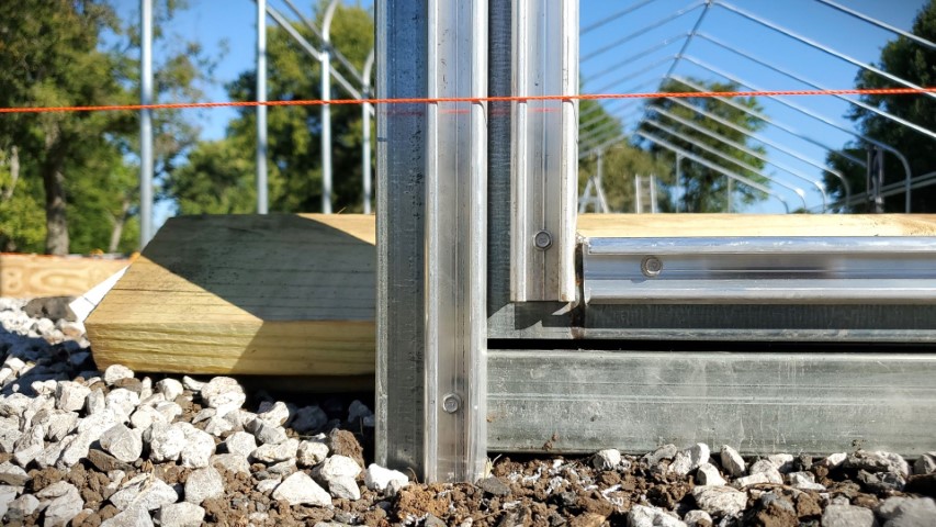 High Tunnel HoopHouse Install Wire Lock Channel