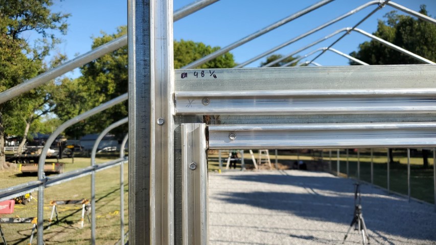 High Tunnel HoopHouse Install Wire Lock Channel